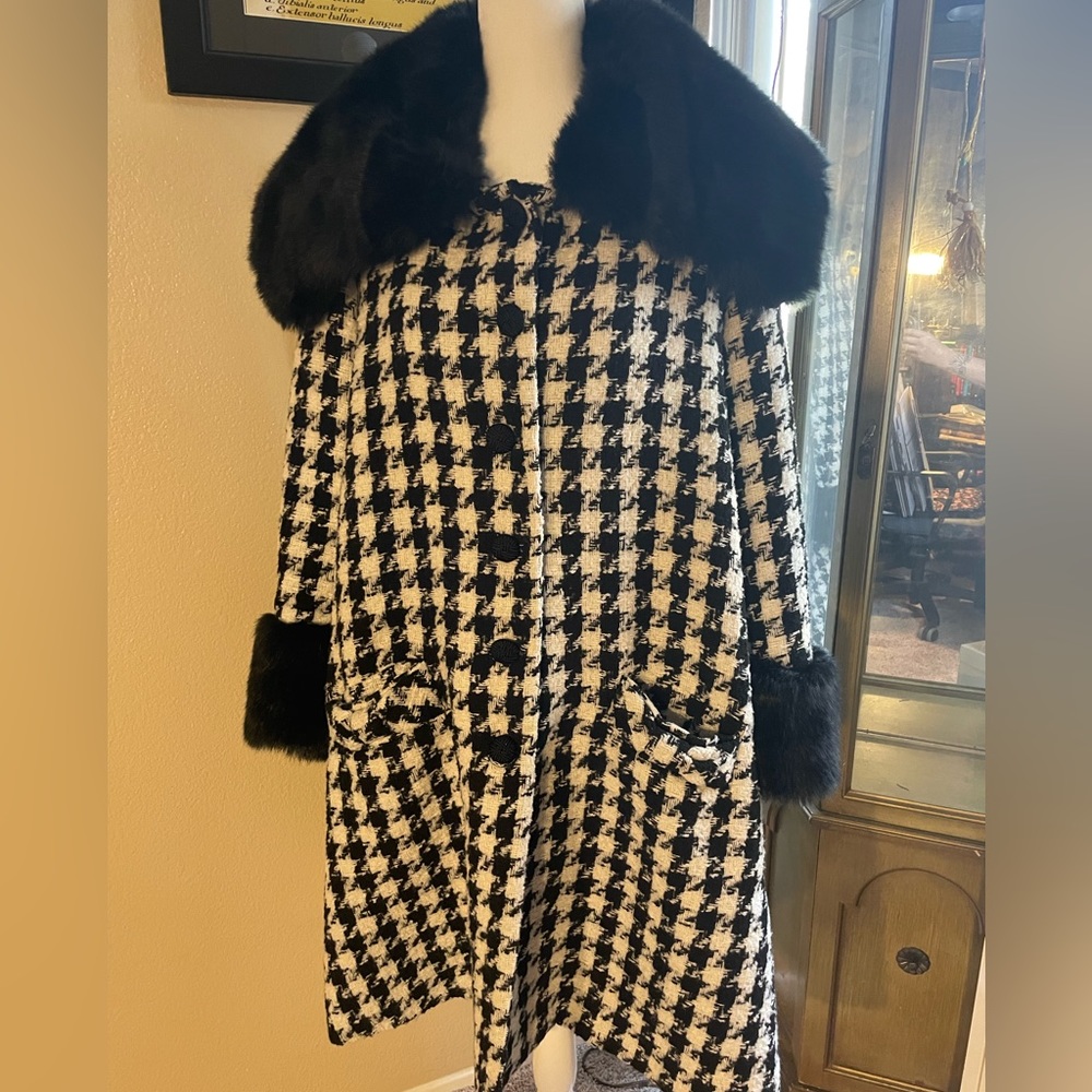 Women’s button down coat I purchased it in London only wore a few times.